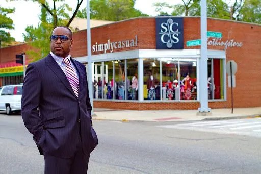 IBA member in front of SimplyCasual on Livernois